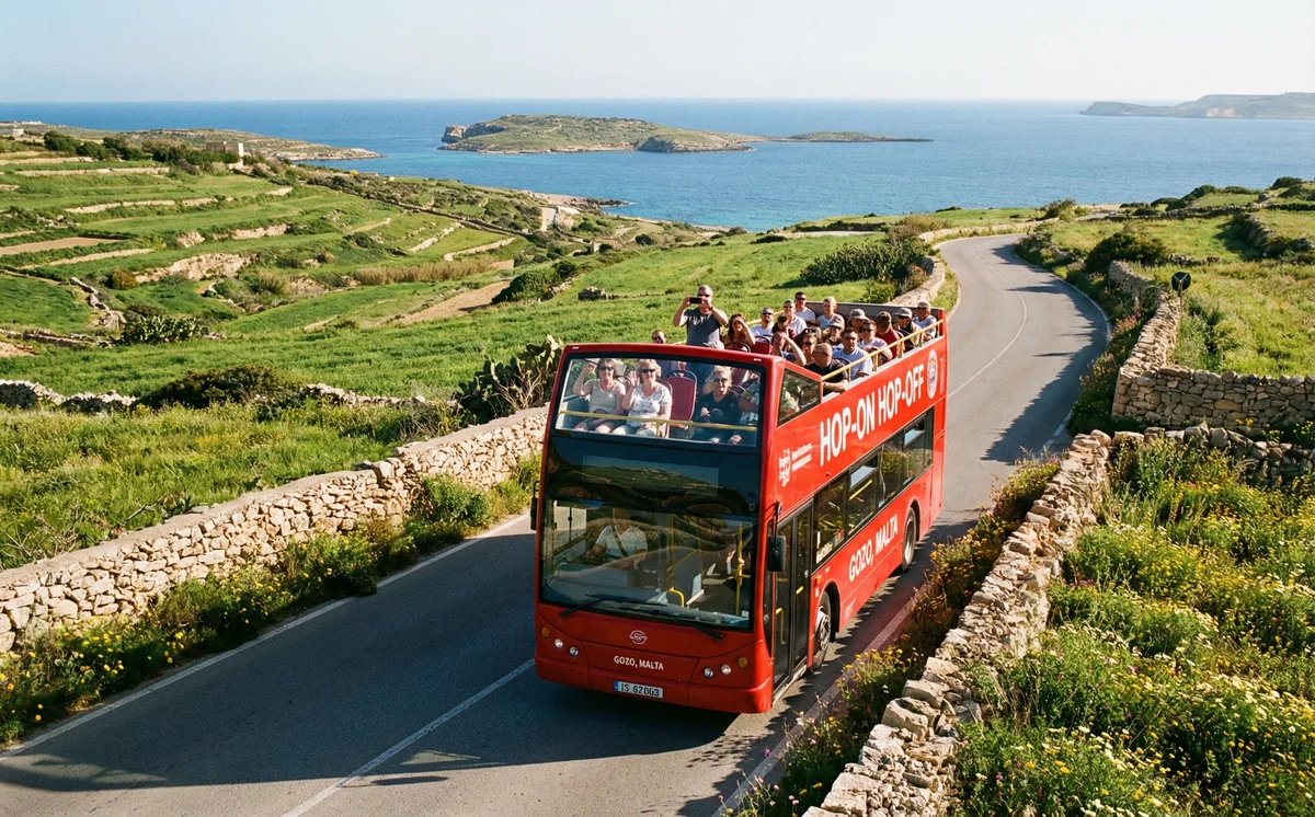 Hop-on hop-off bus on a Gozo road
